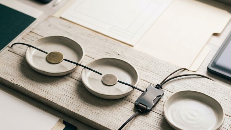 Two token paths between trays, one direct and one through a hardware wallet.